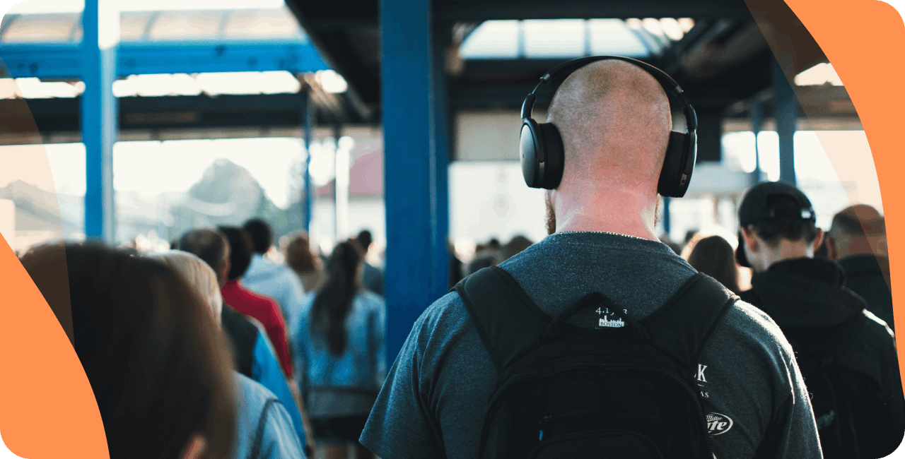 man listening to music in the street