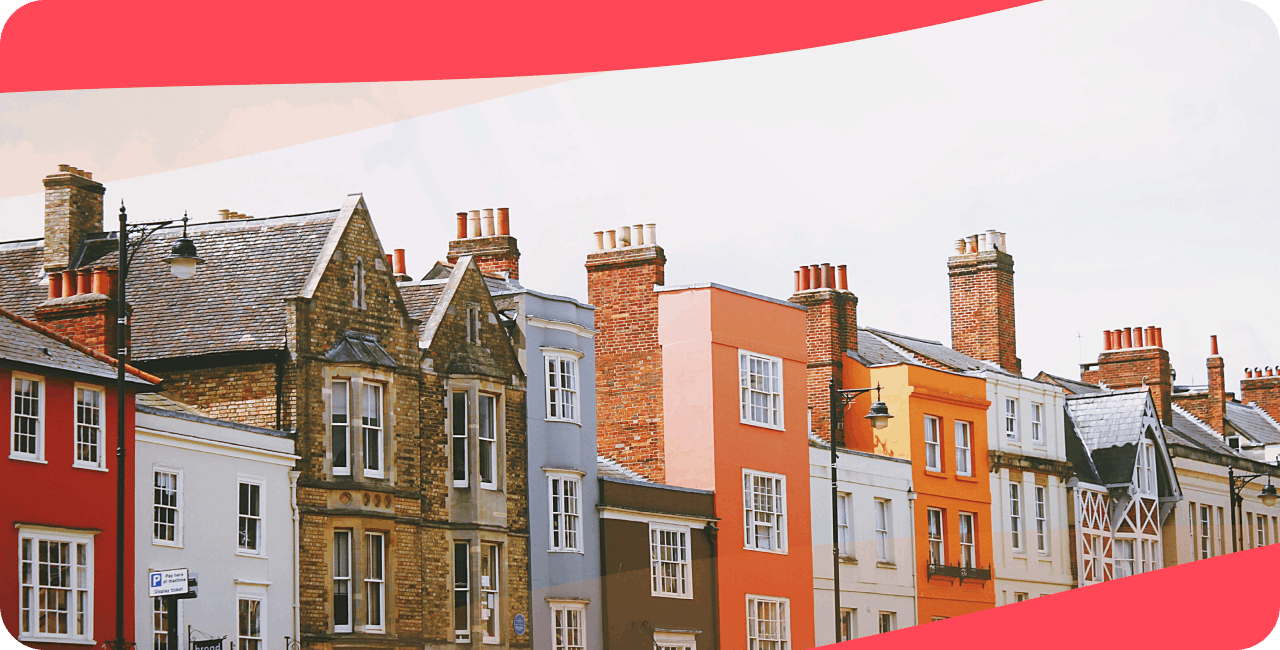 A street of colourful houses, representing a community.